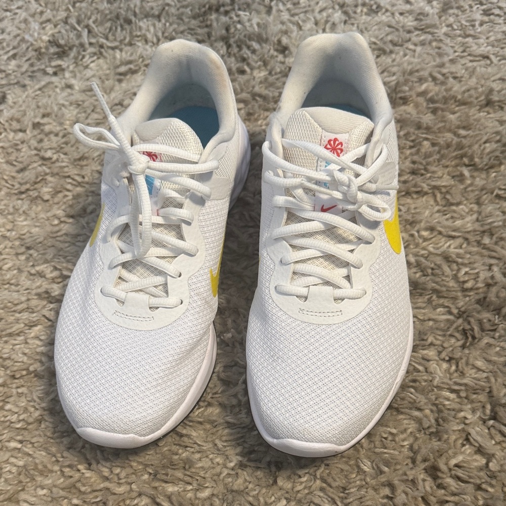 Nike White Sneakers with Yellow and Red Accents